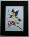 picture of hummingbird with cherry blossom